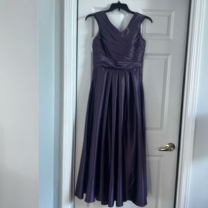 New long dress color plum. Never used